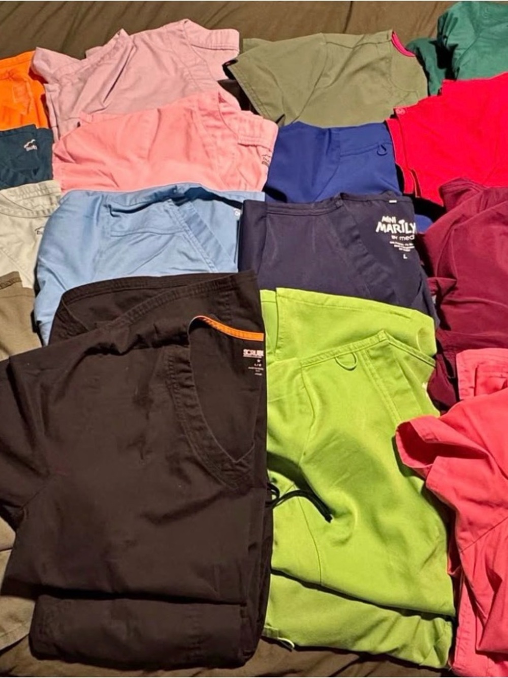 17 scrub tops multi color. Woman’s size large